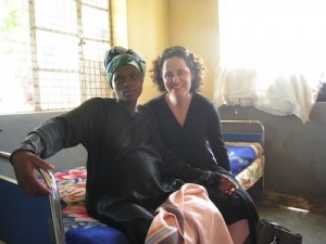 Courtesy Celina Schocken Celina Schocken sits with a pregnant woman in a Ugandan hospital. 