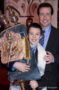 Marcus Schiller at his Bar Mitzvah, with his dad Michael.